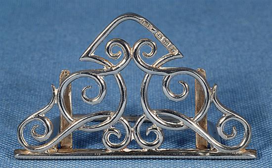 A set of four silver Art Nouveau folding design menu holders, Width 2 ¾” x Height 1 5/8”/42mm Total weight 3oz/84grm